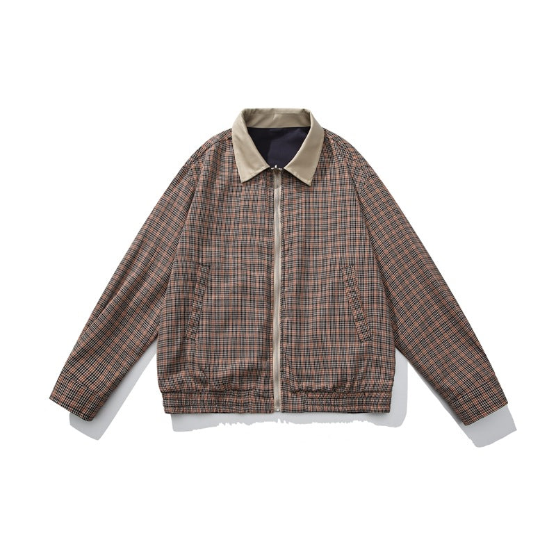 Front view of an orange-brown and dark plaid jacket with a beige collar, zipper, angled pockets and gathered hem.