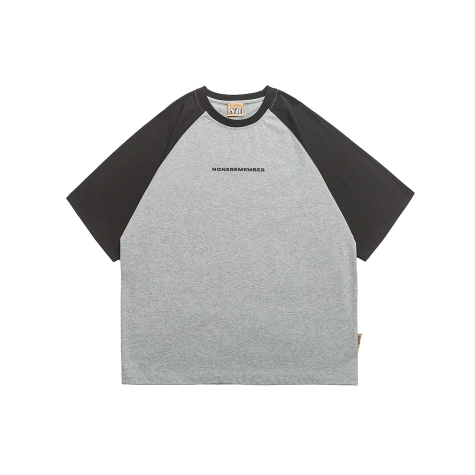 Front view of a heather-gray raglan T-shirt with black sleeves and small chest lettering.