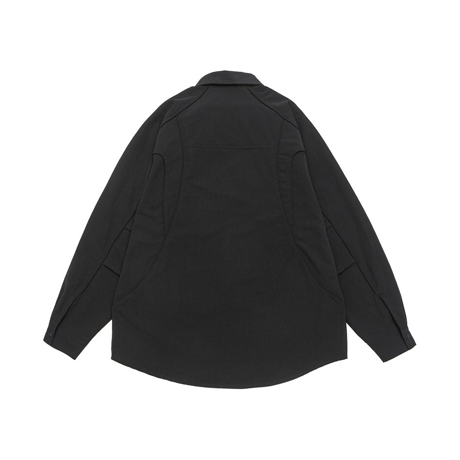 Back view of a black long-sleeve collared shirt laid flat, with curved hem and visible panel seams.