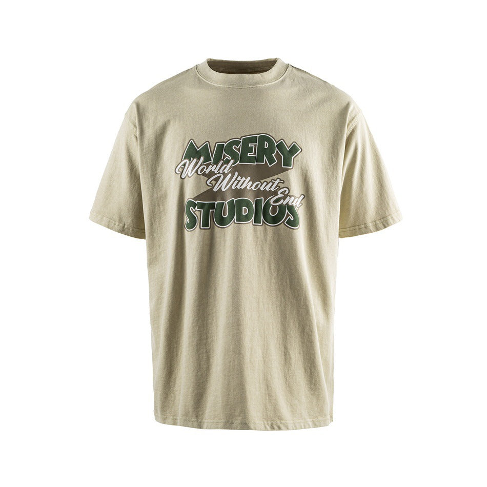 Khaki short-sleeve crew-neck T-shirt with green 'MISERY World Without End STUDIOS' chest print, front view