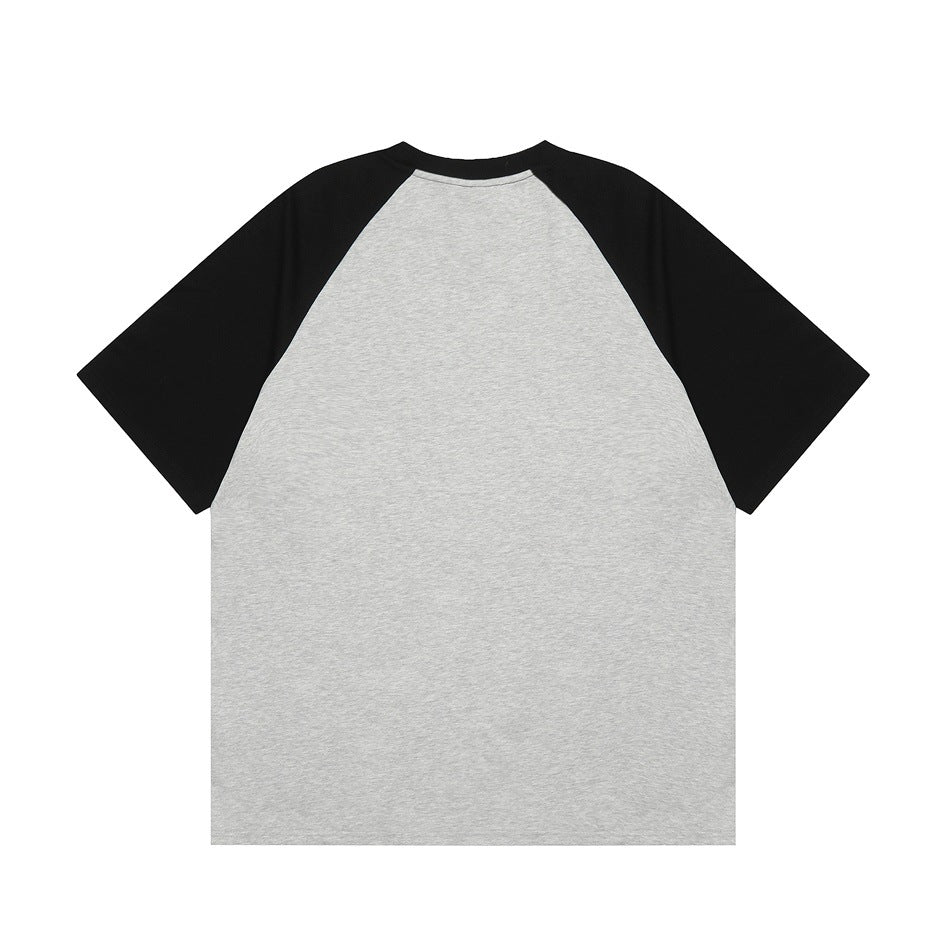 Back view of a heather gray raglan T-shirt with black sleeves and a plain back