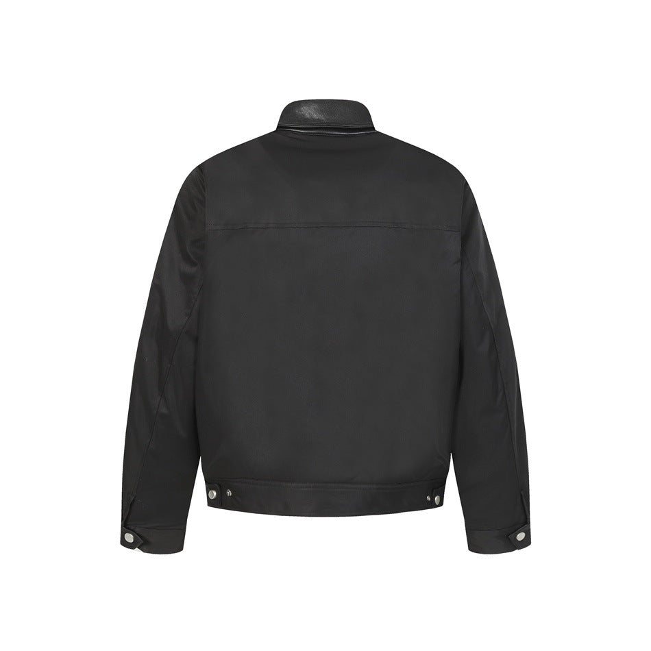 Back view of a black jacket with a black collar, long sleeves, and snap-adjustable cuffs and hem.