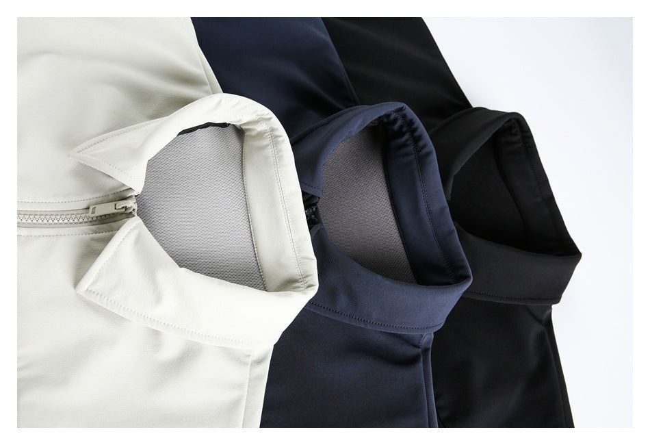 Close-up of jacket collars and upper fronts in off-white, navy and black.