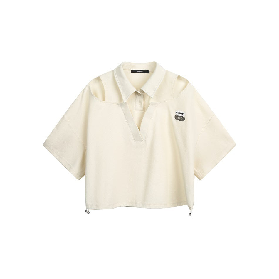 Apricot cropped short-sleeve polo top with shoulder cutouts, V-shaped inset, chest patch and drawstring hem toggles