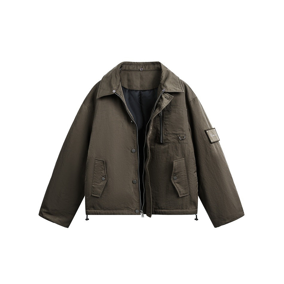 Front view of an olive jacket with a pointed collar, zip closure, chest pocket and two flap pockets.