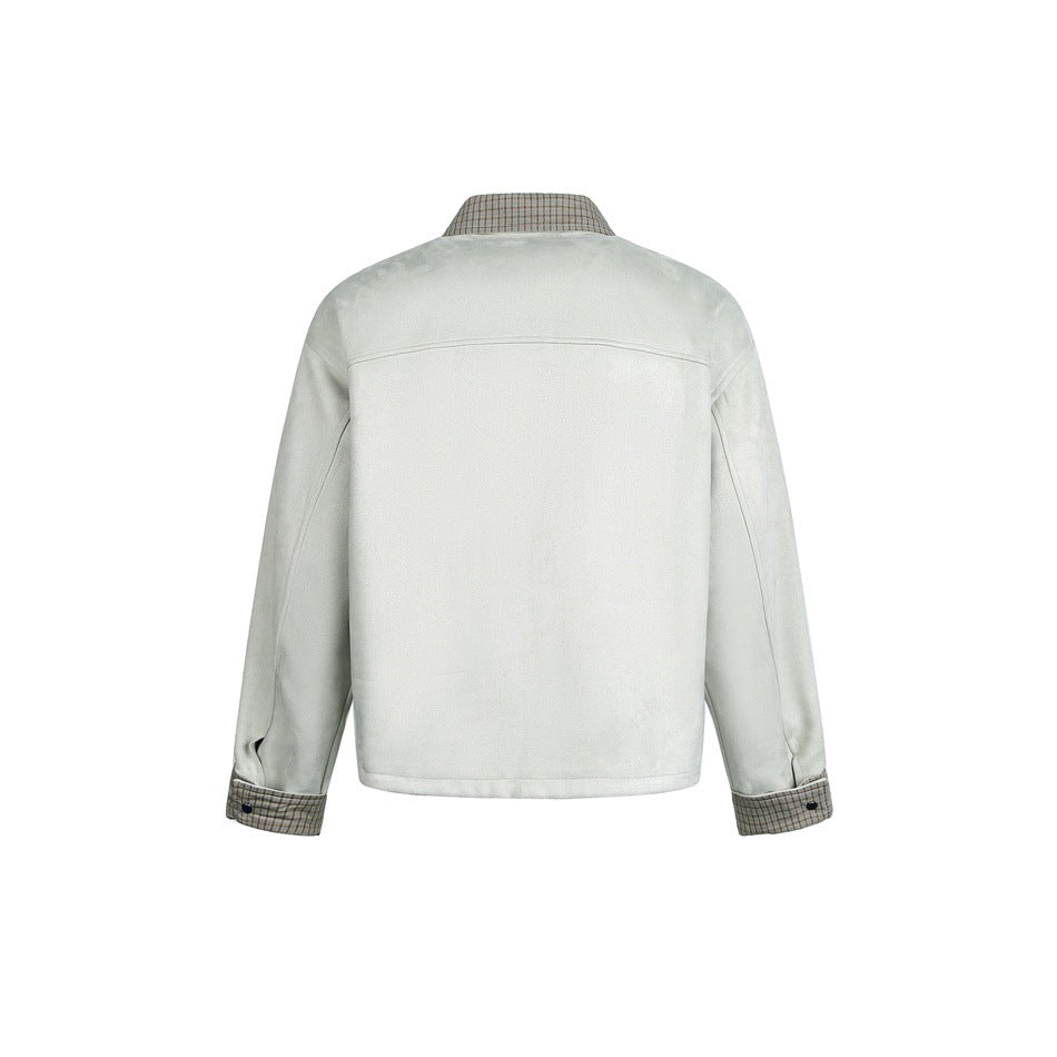 Back view of an ivory jacket with a plaid collar and turned-back plaid cuffs on a white background.