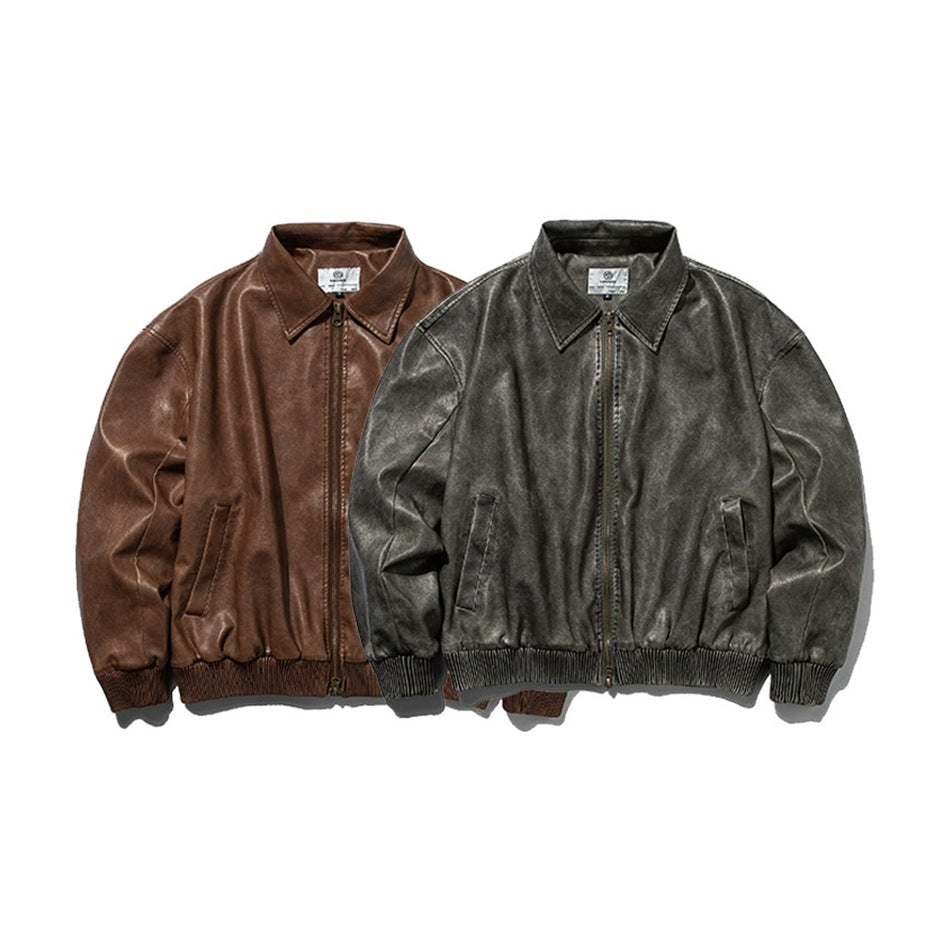 Two zip-front jackets with pointed collars and ribbed trim, shown in brown and charcoal gray.