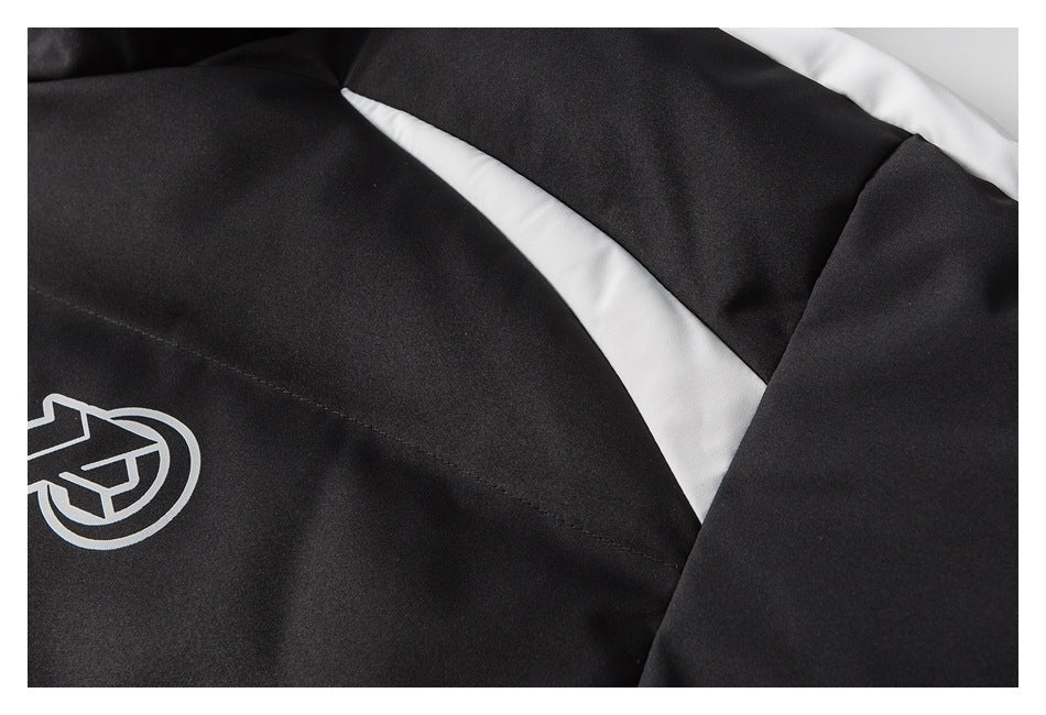 Close-up of the jacket's white shoulder stripe and partial chest emblem.