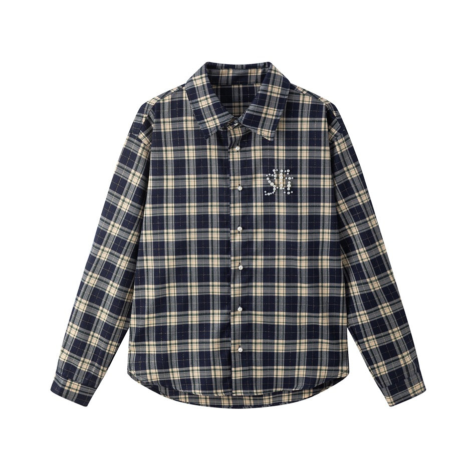 Navy, cream and gray-green plaid long-sleeve shirt with pearl-style buttons and a beaded chest motif, flat front view