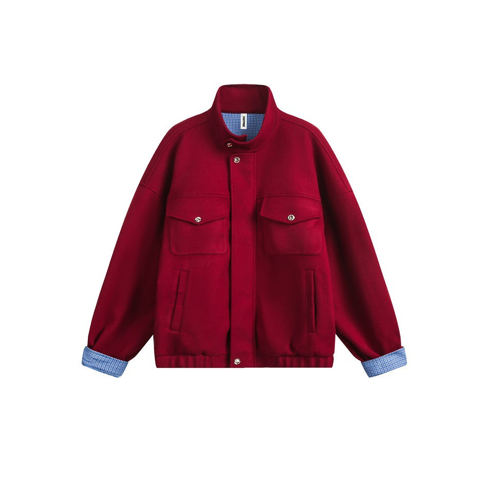 Red stand-collar jacket flat lay with chest flap pockets, gold snaps and blue gingham check cuffs and collar lining