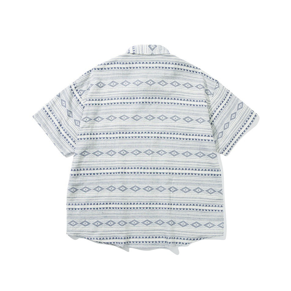 Back view of a white short-sleeve button-up shirt with repeating blue geometric stripes.
