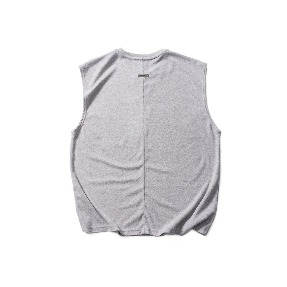 Back view of heather gray sleeveless top with vertical center seam and small metal tag below the neckline