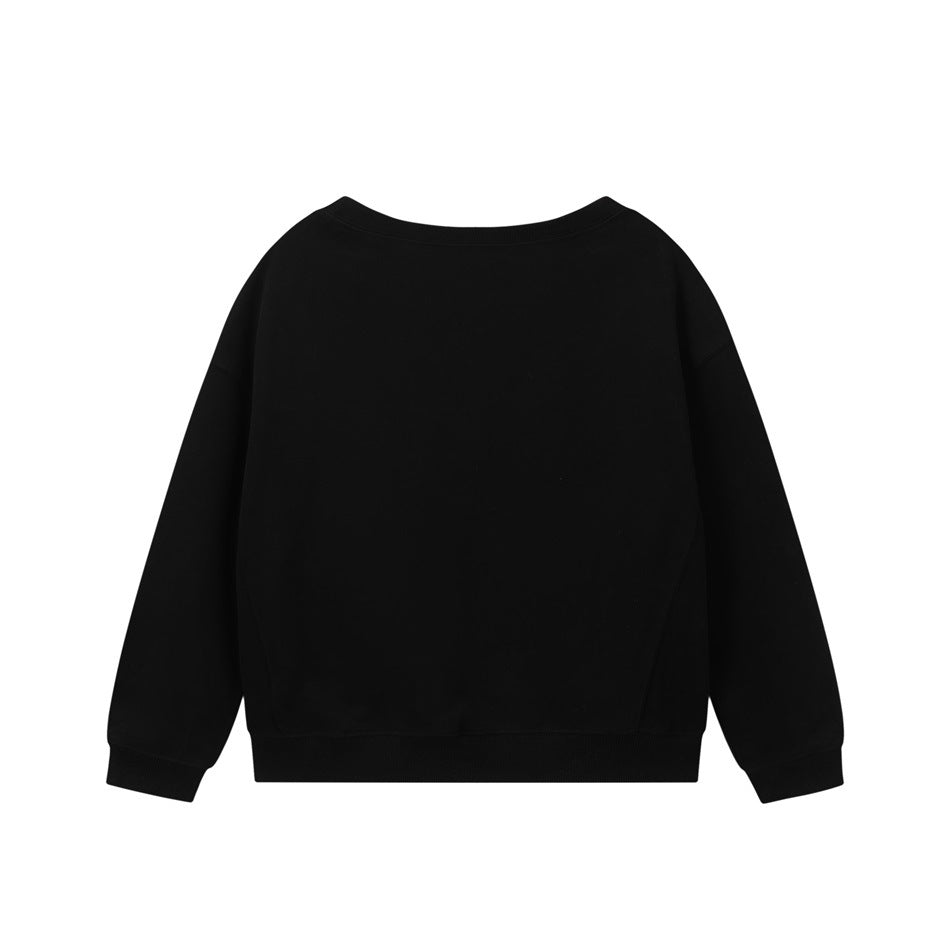 Back view of a plain black crew-neck sweatshirt with ribbed cuffs and hem
