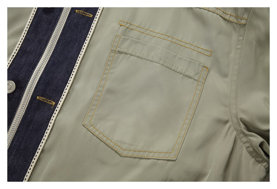 Close-up of an olive-gray patch pocket with contrast stitching beside a dark denim zipper panel.