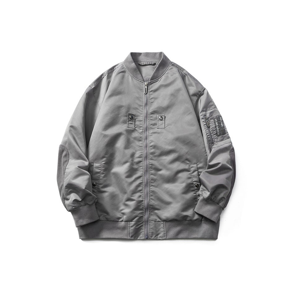 Gray bomber jacket flat lay, front view, with zipper, ribbed collar, chest snap tabs and sleeve pocket