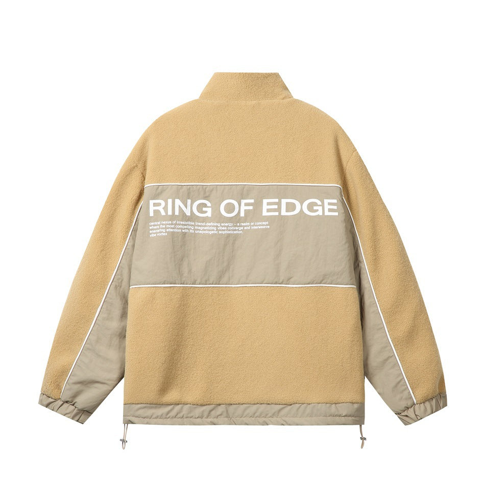 Back view of a tan fleece jacket with beige contrast panels, white piping, and large white text across the upper back.