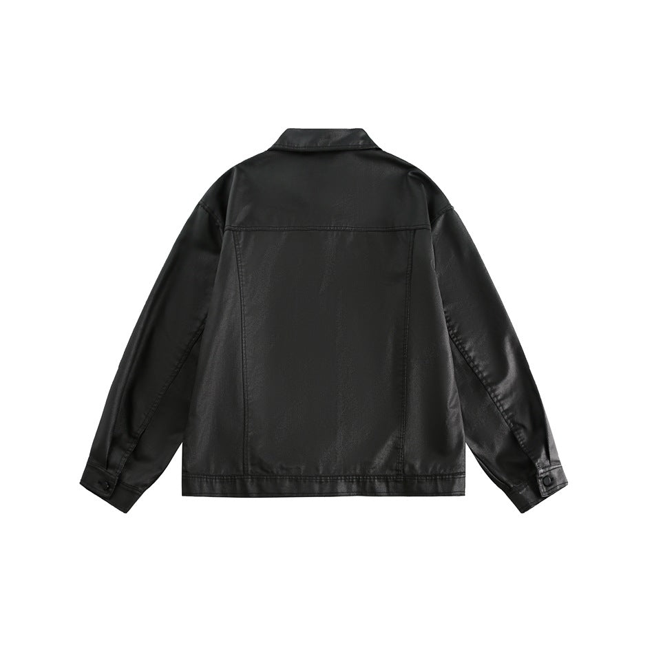 Back view of a black jacket laid flat, with a collar, long sleeves, and a stitched center panel.