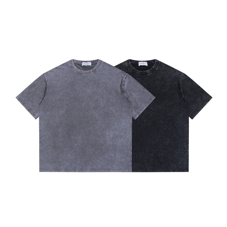 Two plain short-sleeve crew-neck T-shirts shown from the front in gray and black washed finishes.