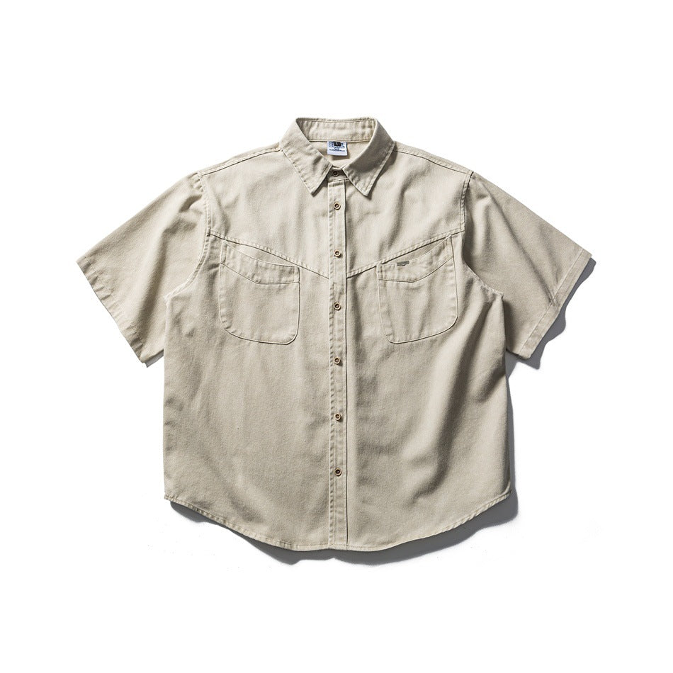 Khaki short-sleeve button-front shirt with chest flap pockets and pointed collar, flat lay front view