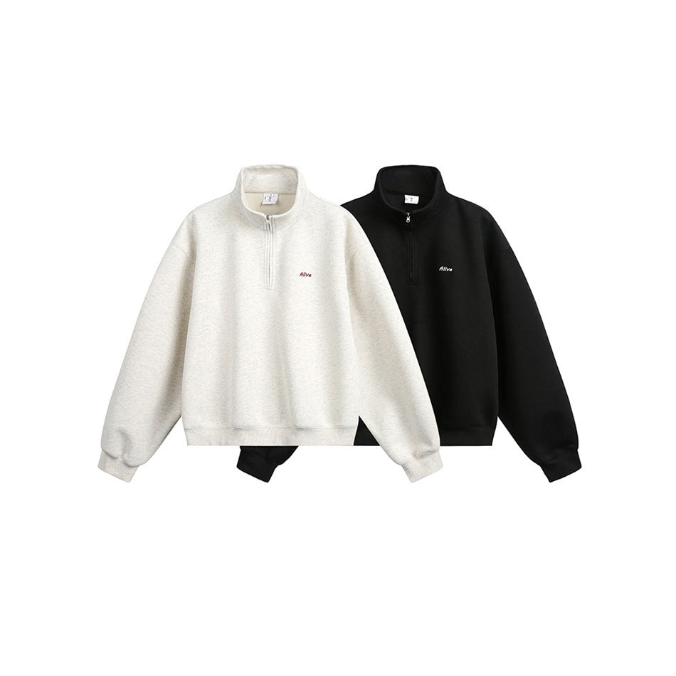 Two quarter-zip sweatshirts shown side by side in light oatmeal and black, each with small chest embroidery.