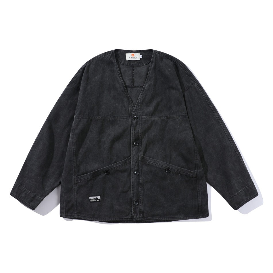 Black washed collarless V-neck button jacket with angled front pockets, flat lay front view