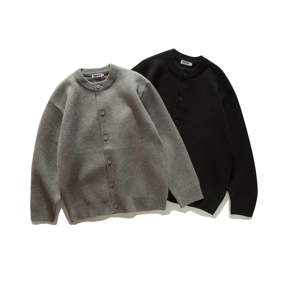 Two button-front knit cardigans shown from the front: one gray and one black, with ribbed collars, cuffs, and hems.