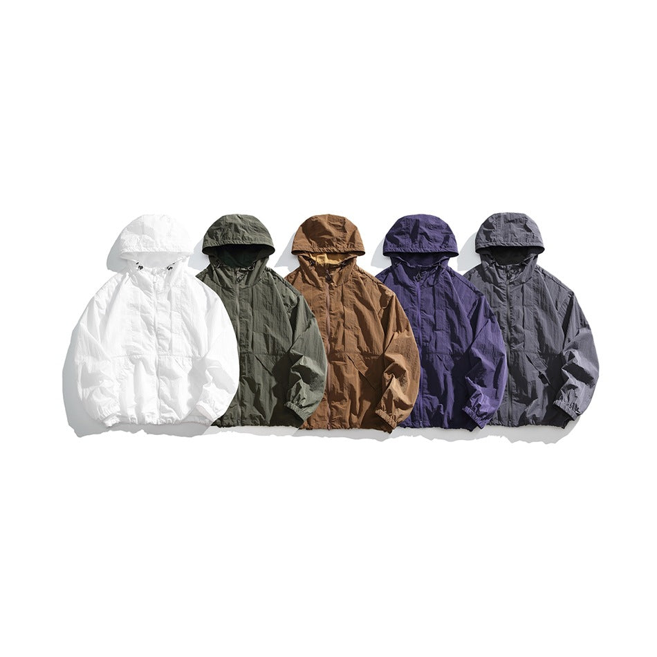 Five hooded zip-up jackets arranged together in white, dark olive, brown, purple and charcoal gray.