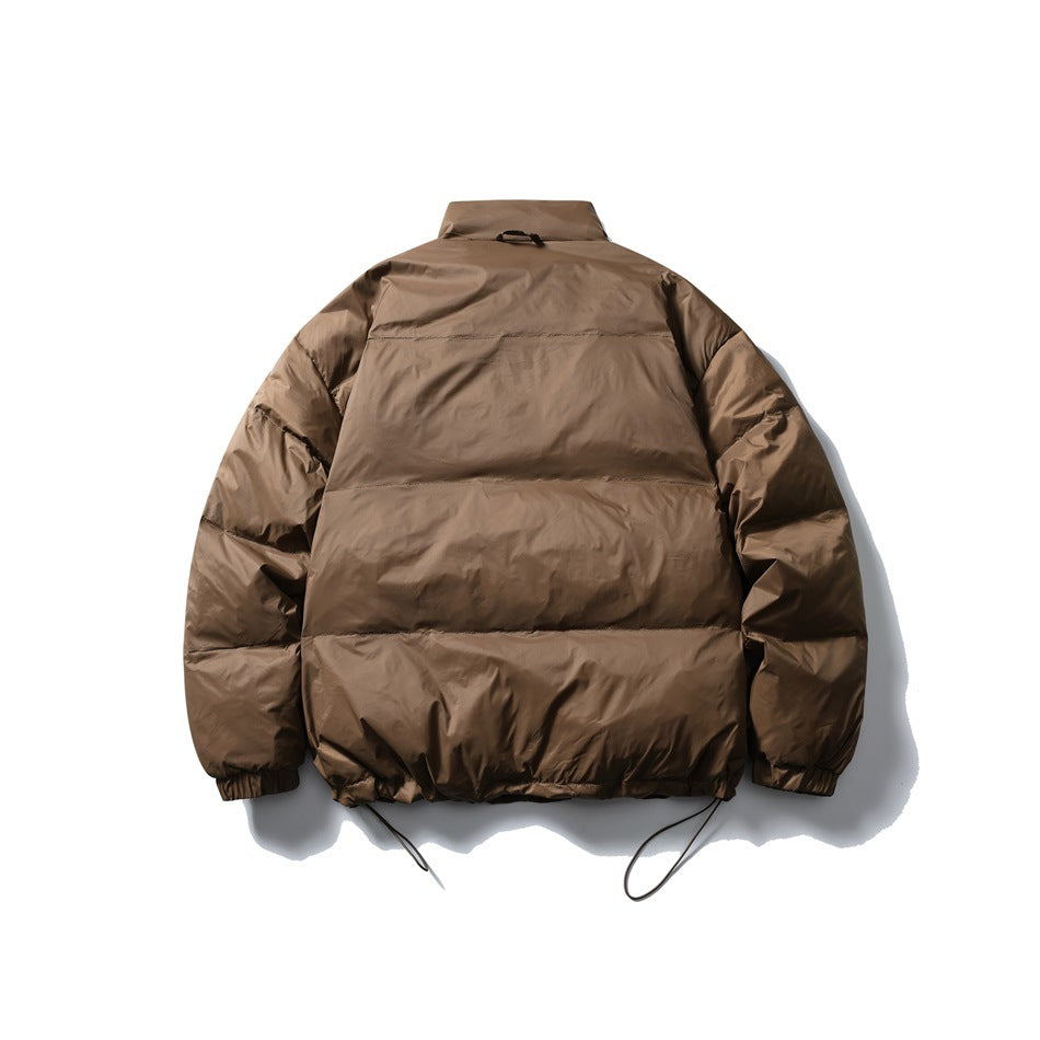 Back view of a brown quilted puffer jacket with a stand collar, elastic cuffs, and adjustable drawcord hem.