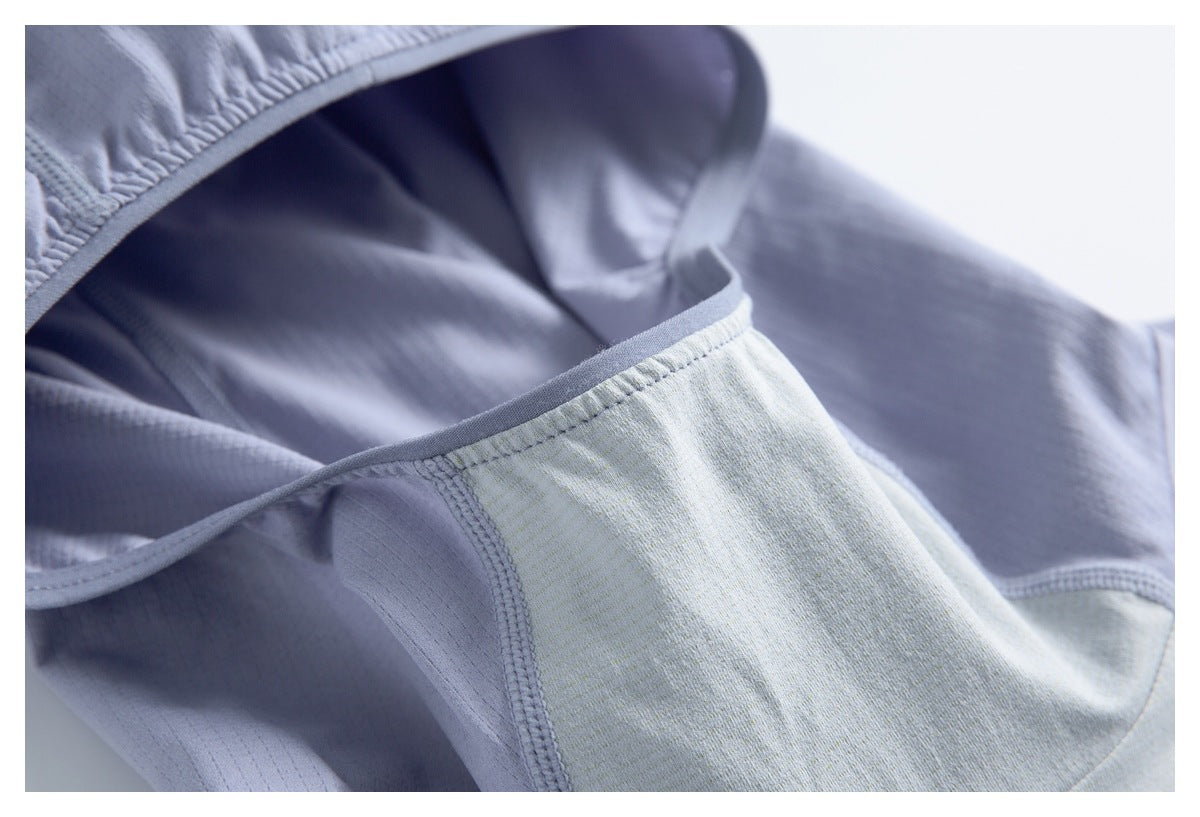 Close-up of the hood's inner panel, seam stitching, and pale contrasting fabric.