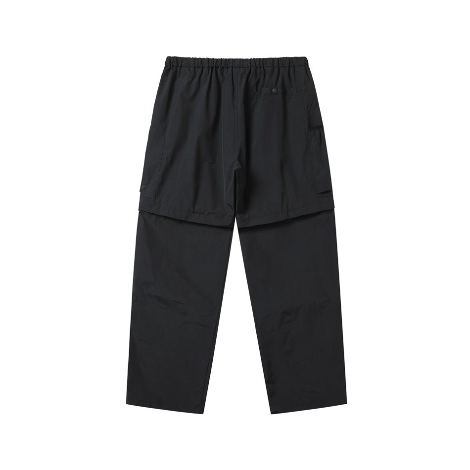 Black detachable cargo pants, back flat lay with elastic waist, snap back pocket and side cargo pockets