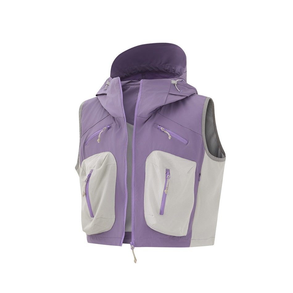Front view of a lavender hooded utility vest with light gray panels and multiple zippered pockets.