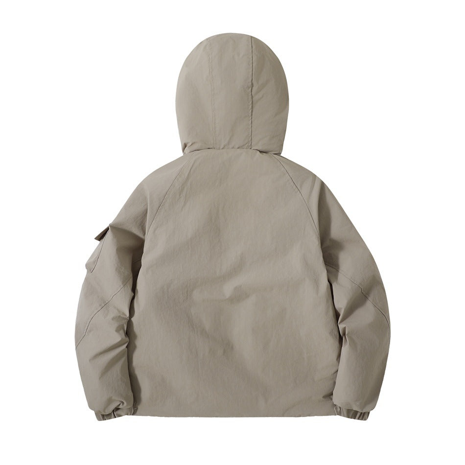 Back view of a taupe hooded jacket laid flat, with long sleeves and elasticated cuffs.