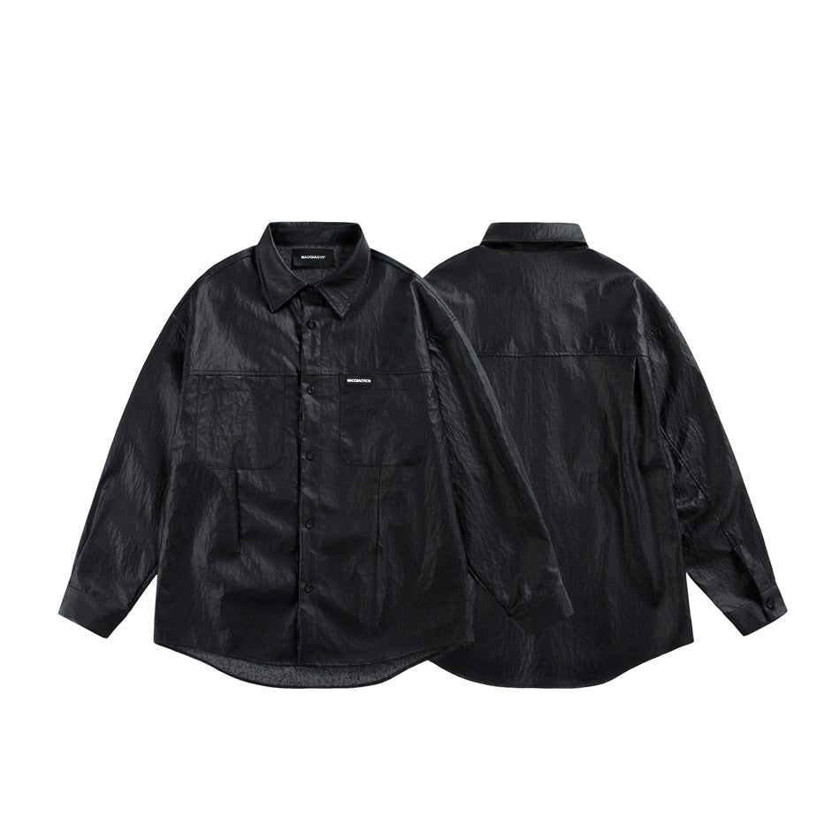 Black long-sleeve button-up shirt shown flat from the front and back, with pointed collar and two front pockets.