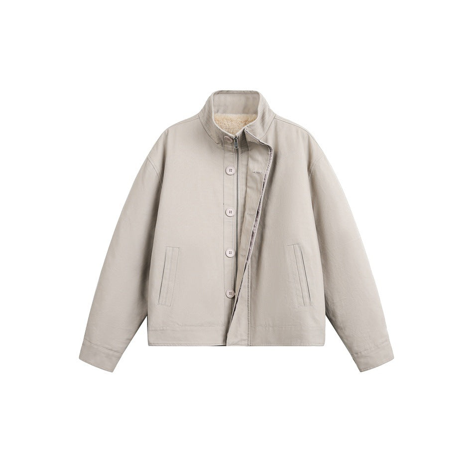 Beige stand-collar jacket flat lay with front buttons, zipper placket, slanted pockets and cream fleece-like collar lining