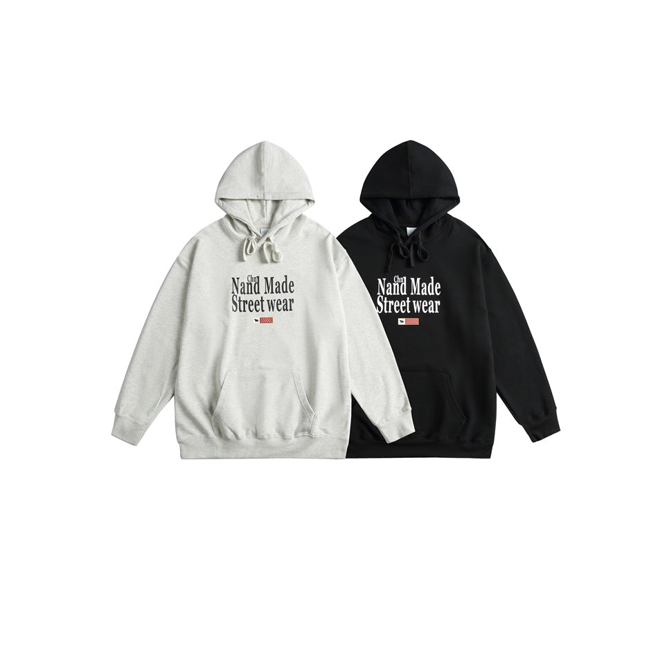 Light gray and black pullover hoodies shown side by side, each with a front graphic, kangaroo pocket, and drawstring hood.