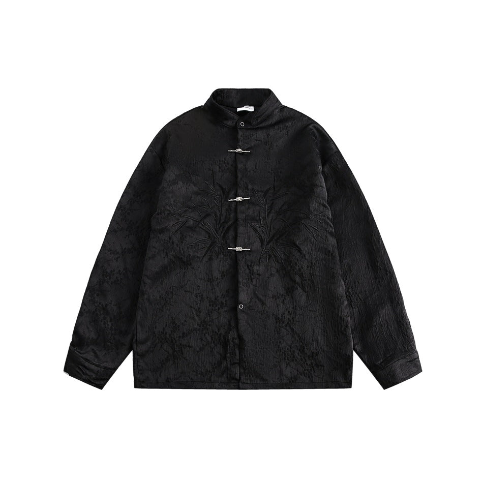 Black stand-collar long-sleeve shirt with three metal knot closures and tonal embroidered bamboo, flat front view