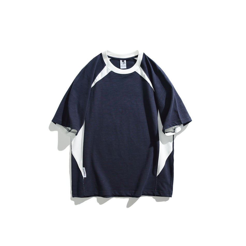 Navy short-sleeve raglan T-shirt with white collar, shoulder and side panels, flat lay front view
