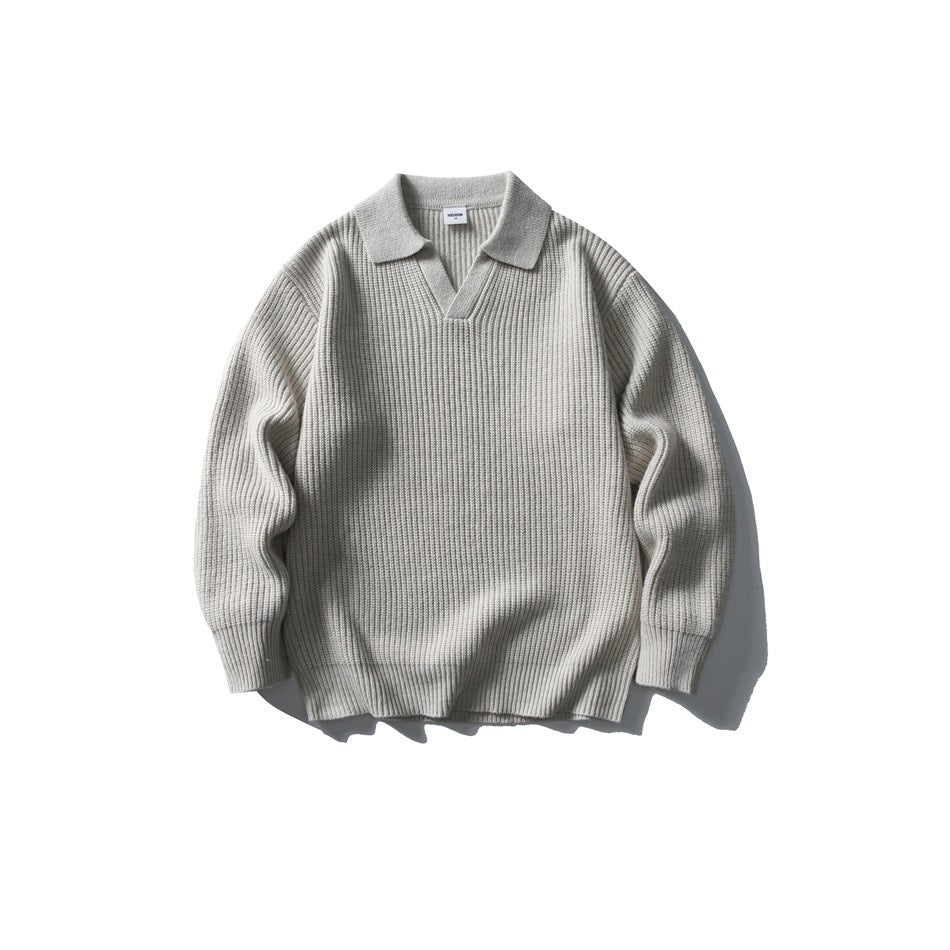 Light gray ribbed knit pullover sweater with polo-style collar and V-neck opening, flat lay