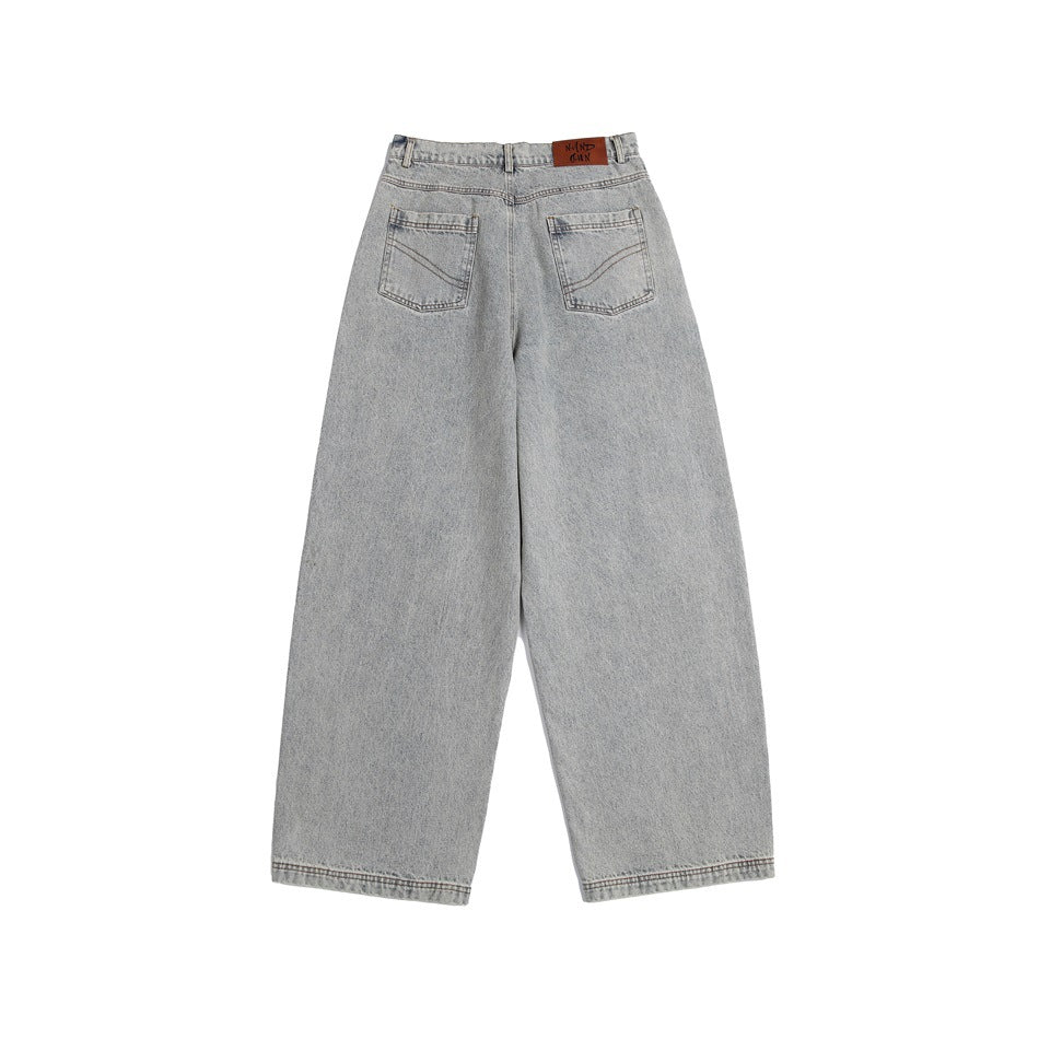 Light blue washed wide-leg jeans, back flat view with two patch pockets and a waistband patch