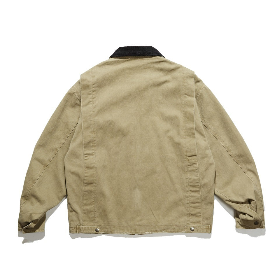 Back view of a khaki jacket with a black collar, panel seams, cuff tabs, and snap-adjustable hem tabs.