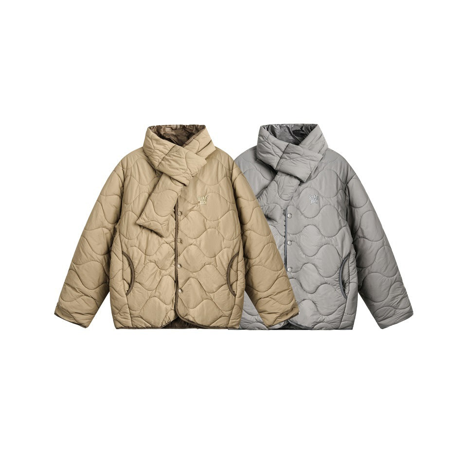 Front views of the wave-quilted jacket in tan and gray, each with a padded wrap collar and snap buttons.
