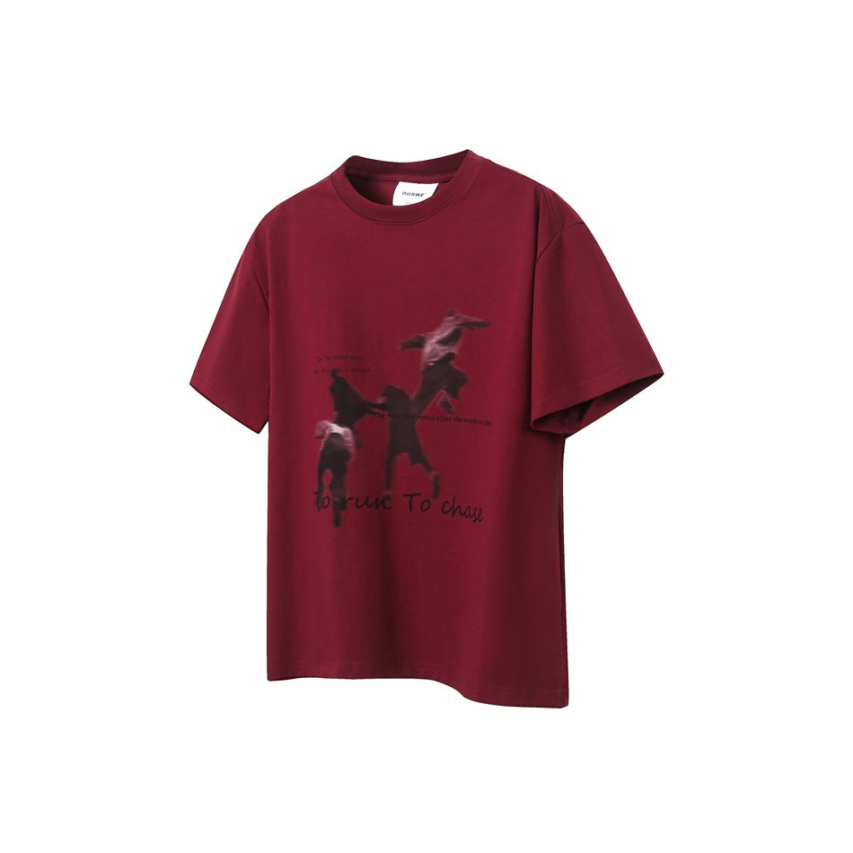 Burgundy short-sleeve crew-neck T-shirt with blurred leaping figures graphic and script text on the front