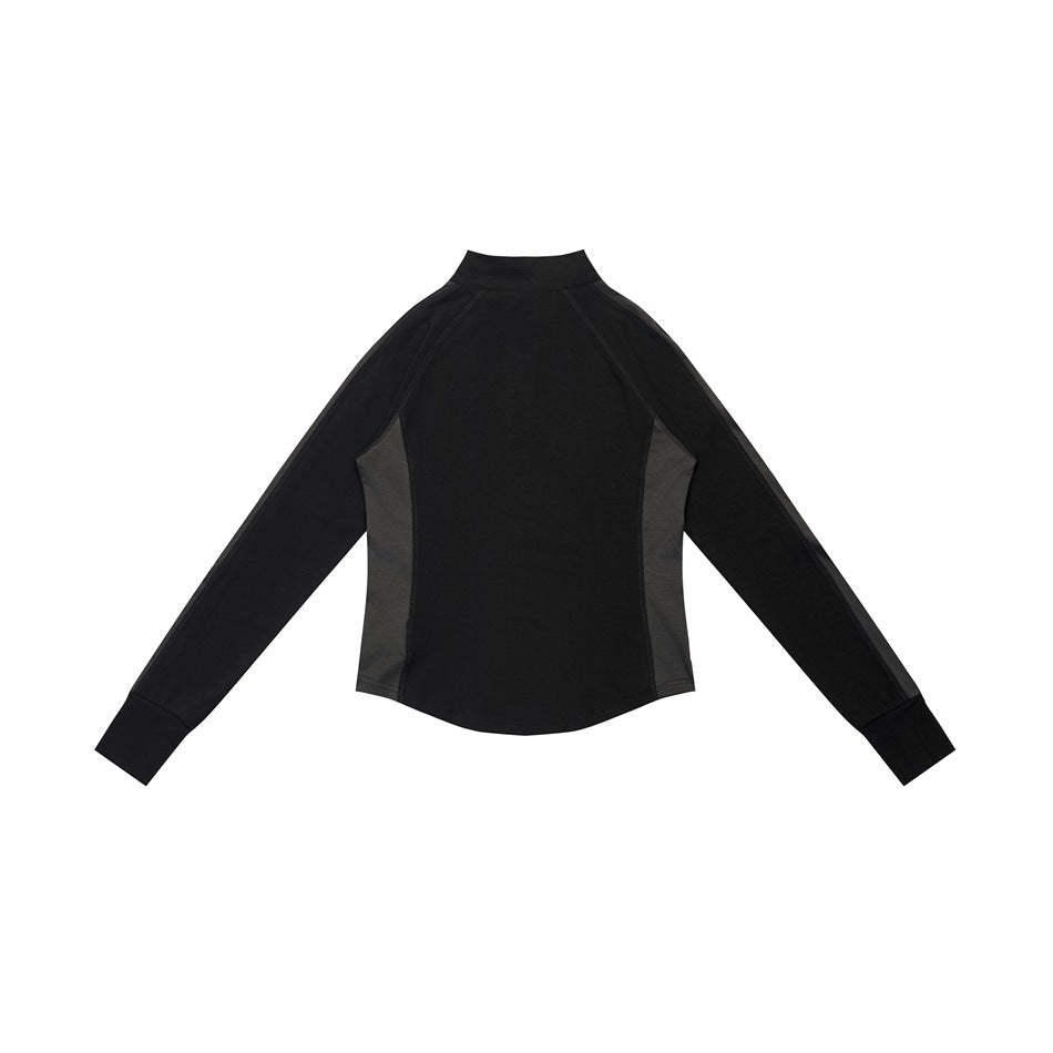 Back view of a black long-sleeve top with dark gray side panels and a stand collar.