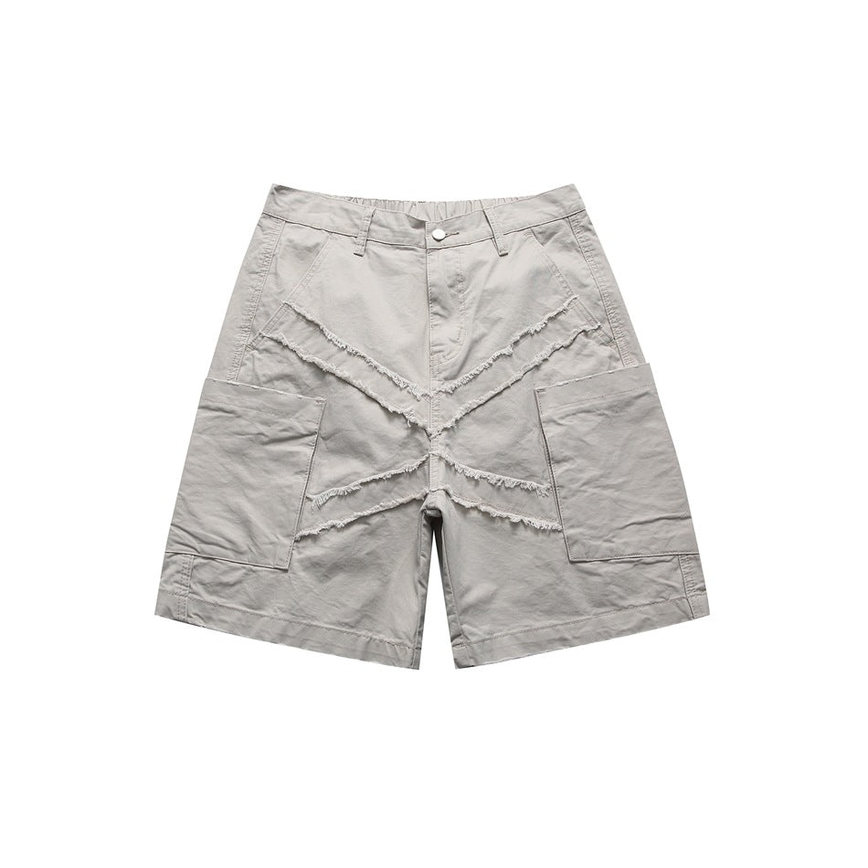 Light gray knee-length cargo shorts with frayed X-shaped seams on the front and large side patch pockets