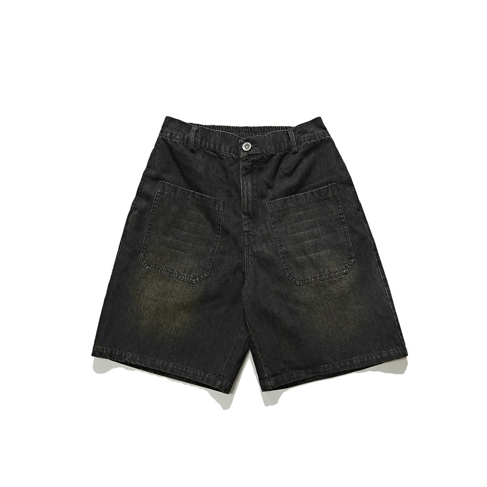 Dark gray washed denim knee-length shorts, front flat lay with two large patch pockets and button fly