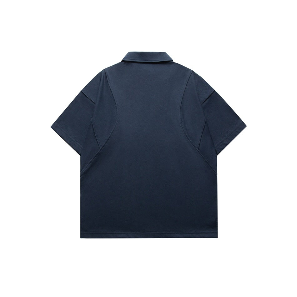 Navy blue short-sleeve polo shirt, back view, with curved paneled seam lines and a folded collar