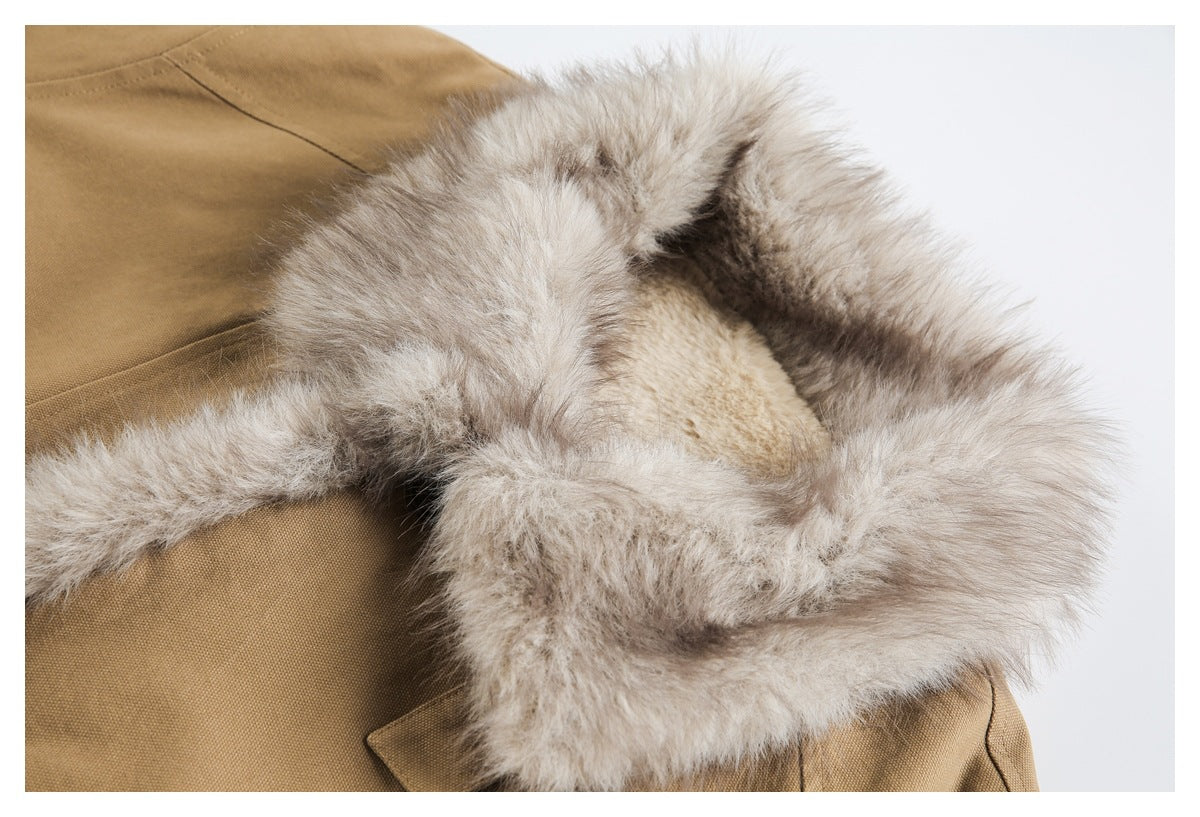 Close-up of the tan jacket's thick light fur collar and pale inner lining.