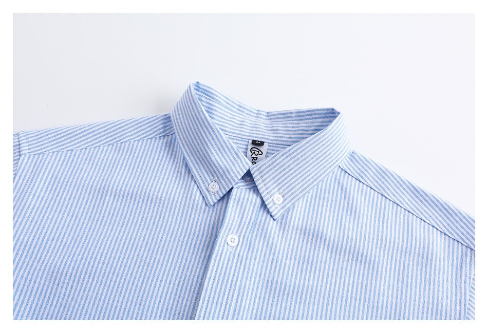 Upper front of a light blue and white striped shirt, showing its button-down collar and placket.