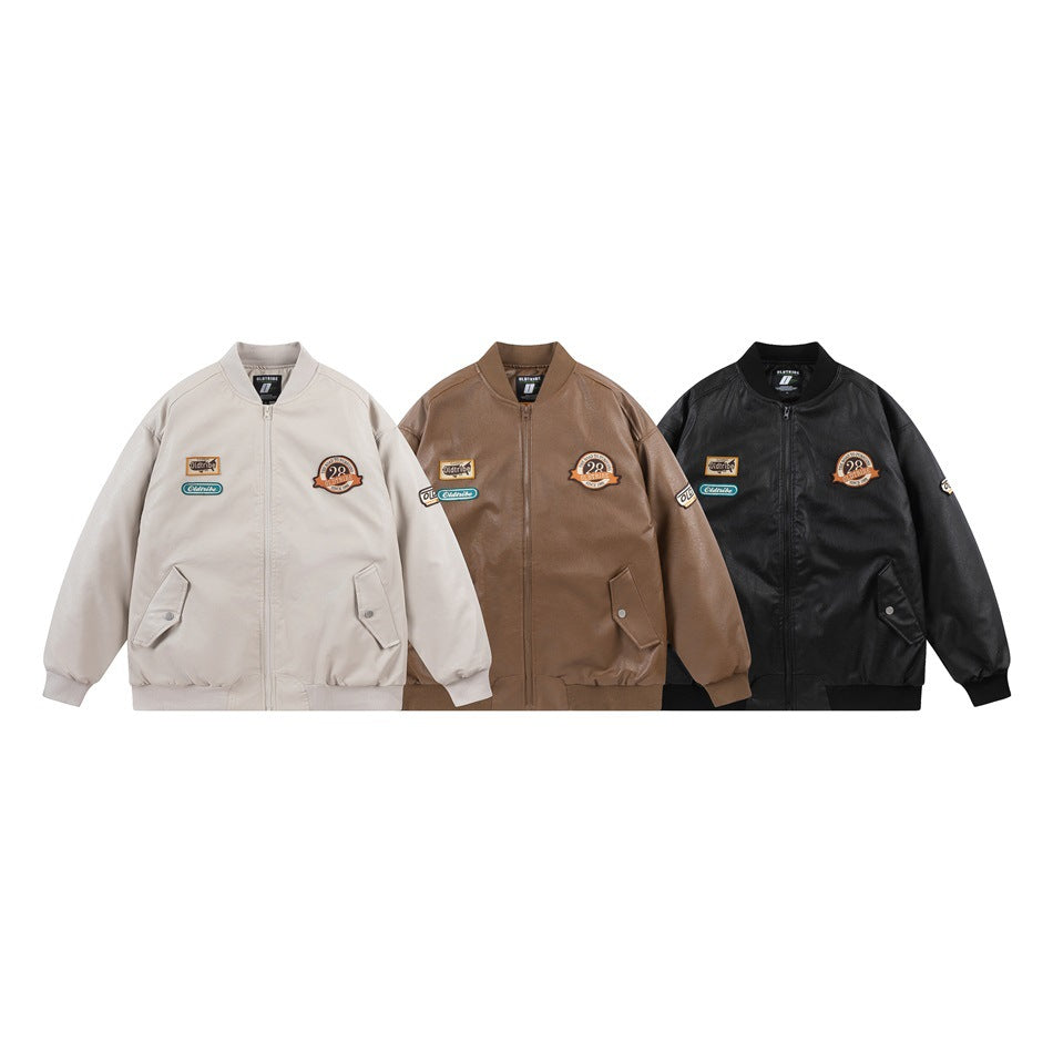 Three front views of a patch-decorated bomber jacket in ivory, brown, and black.