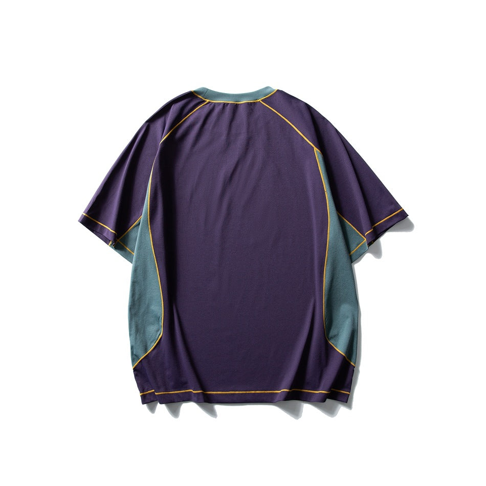 Back view of a purple short-sleeve T-shirt with teal side panels and yellow contrast stitching.